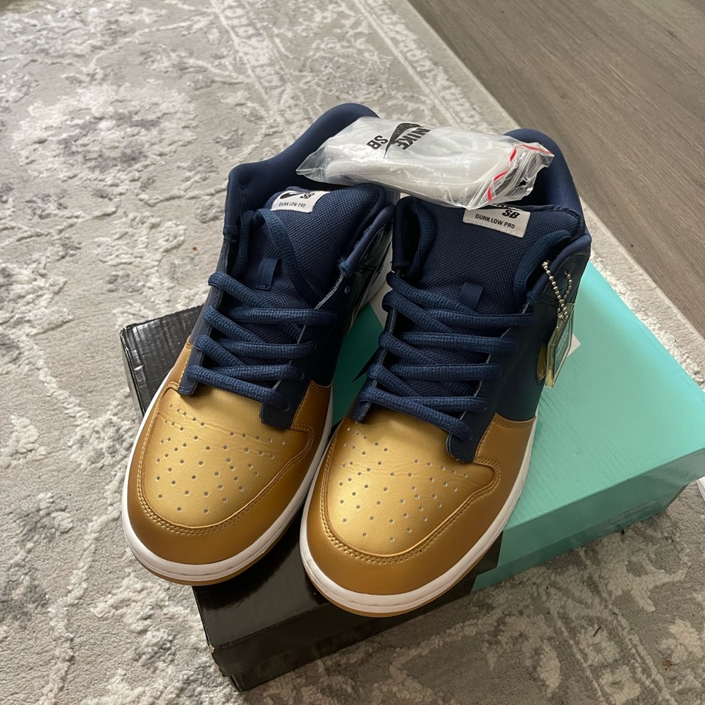 Supreme × Nike SB Dunk Low OG QS Men's Size
12 Navy Gold Jewel